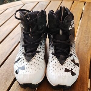 Under Armour Kids Black and White Football Cleats.